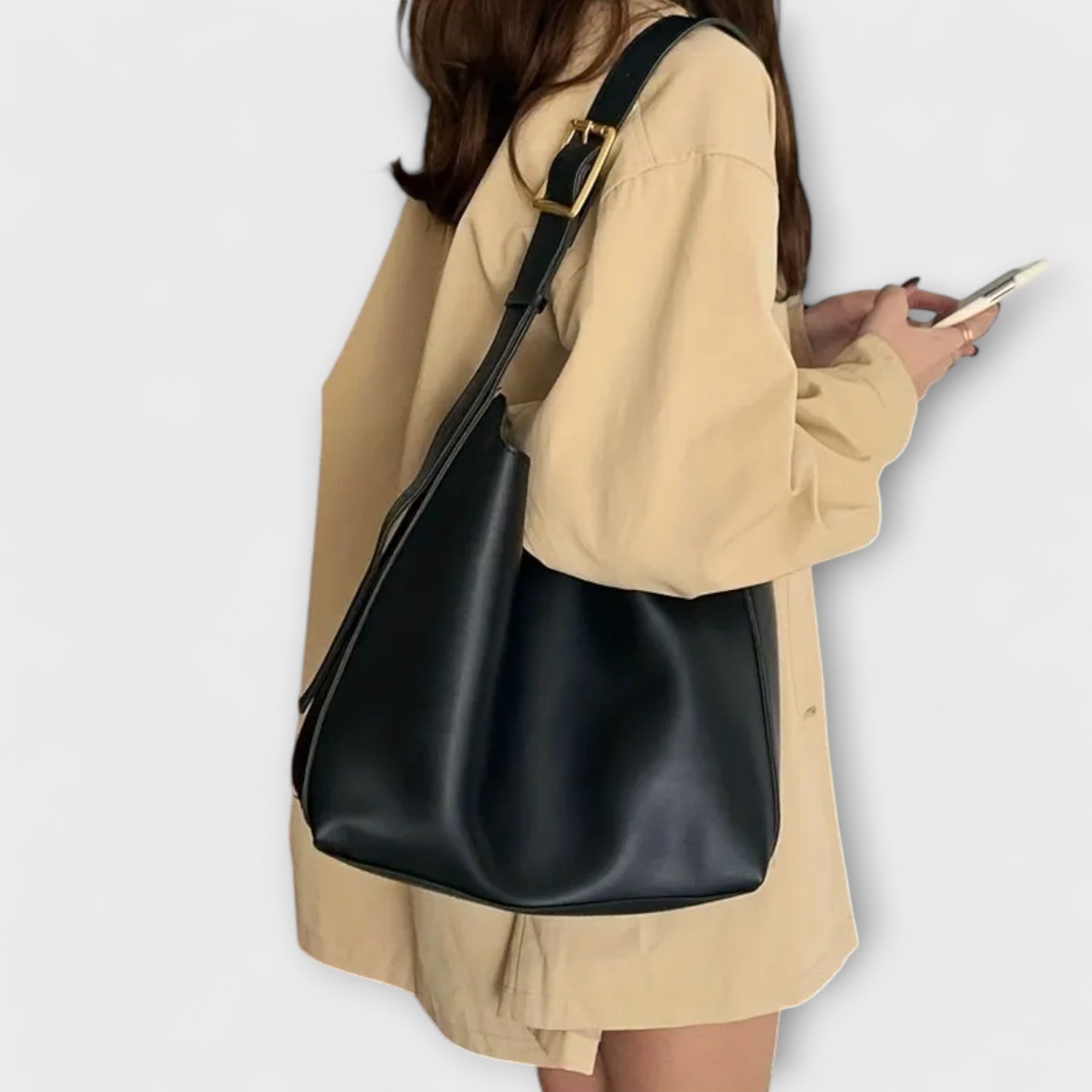 Checks. – Elegant leather shoulder bag